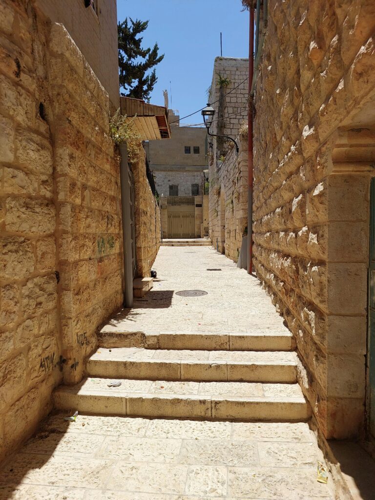 Charming stone alleyway in Bethlehem's historic district, showcasing classic Middle Eastern architecture.